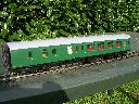 Part of the 3 coach set No. 542 , as running after refurbishment.Supplied with the corridor connectors retracted on the outer ends , with end plate fitted.  BR Mk1 bogies , \'aquitrain\' single link couplings.